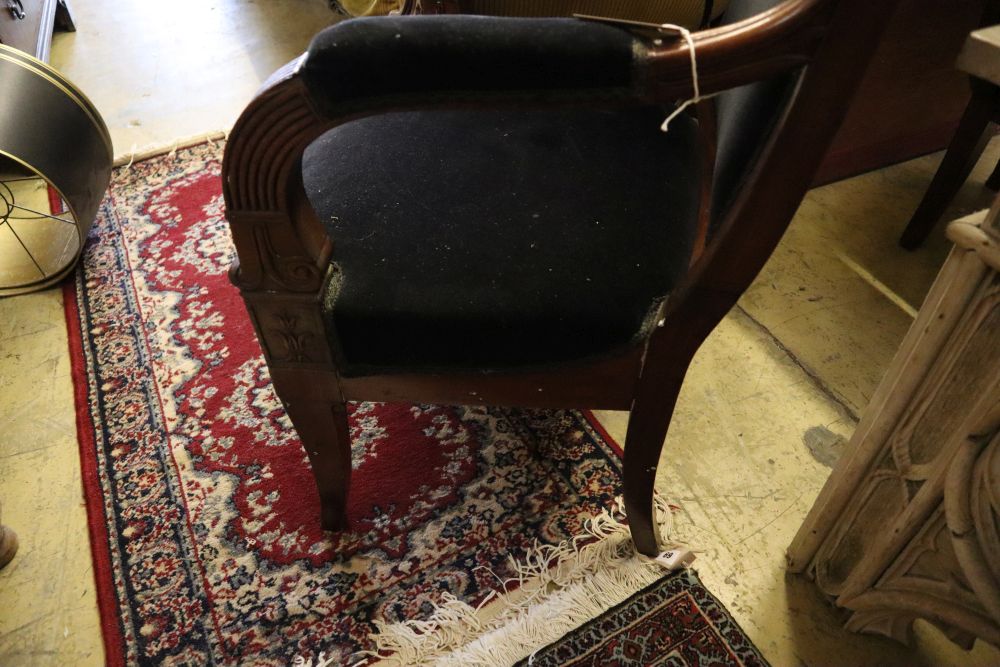 A 19th century French Empire fauteuil